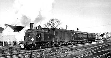 Castleman's Corkscrew: a 1961 steam train leaving Brockenhurst station, heading for Ringwood along the Corkscrew