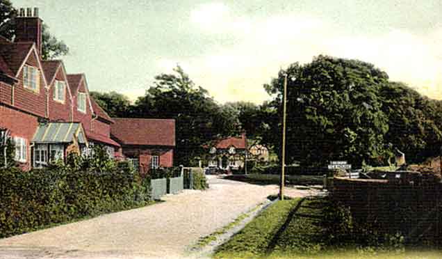 Burley - the cottages shown above, seen at around the same time but viewed in the opposite direction