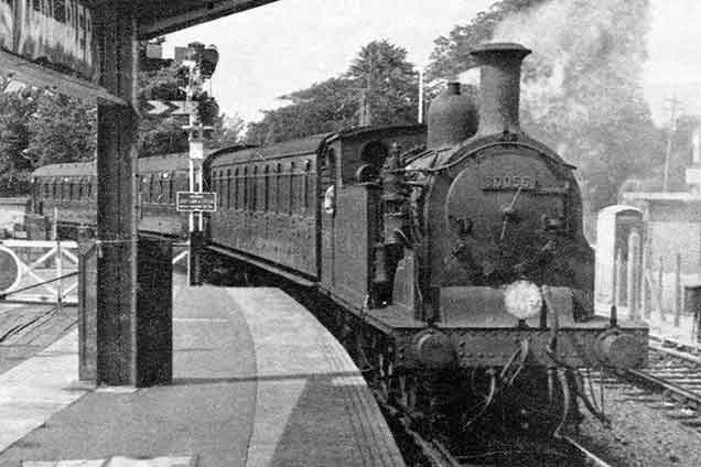 Lymington -  a steam train pulls into Lymington Pier station
